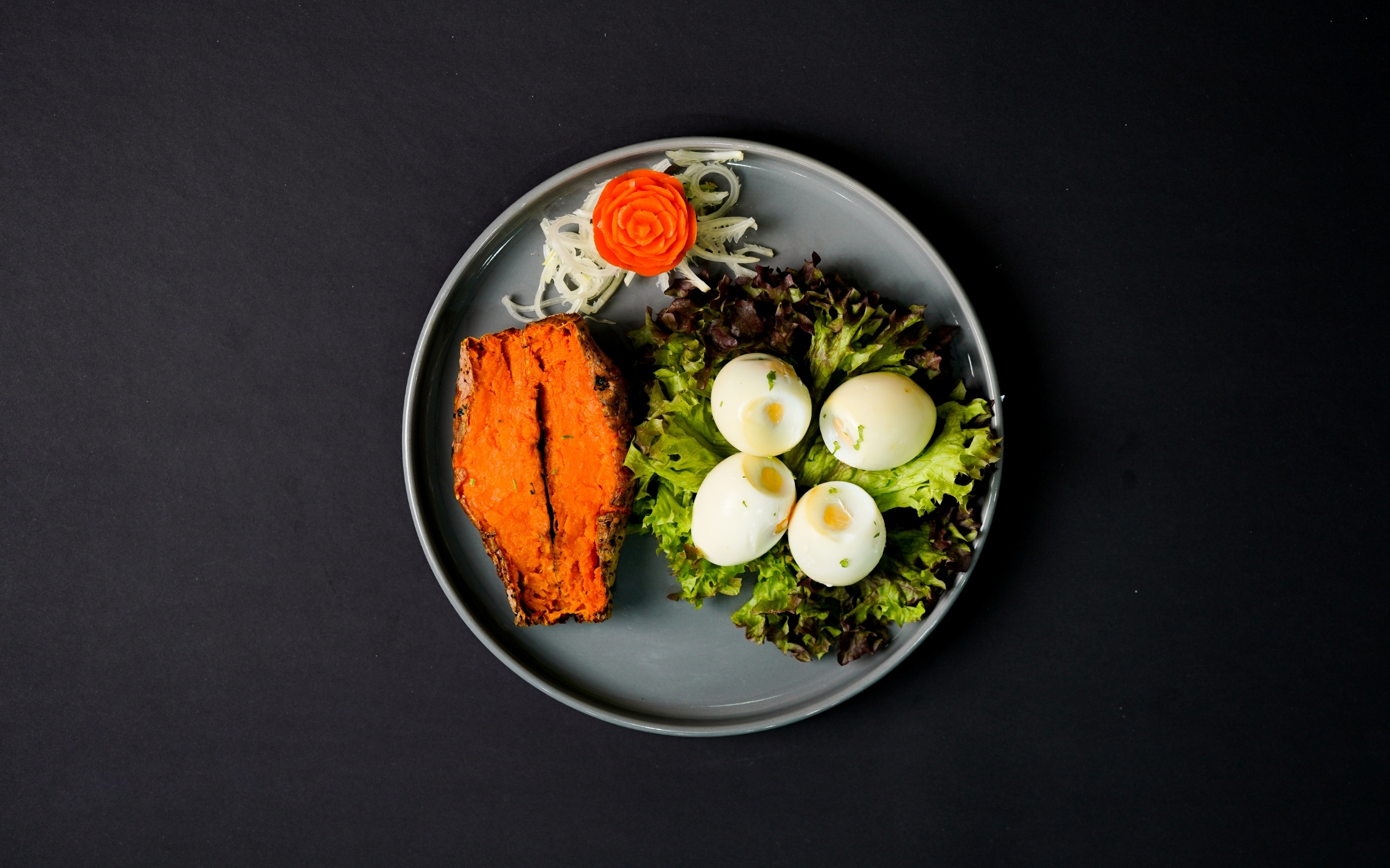 Boiling egg with fresh sweet potato